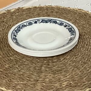 Vintage Corelle 4 saucers plates.